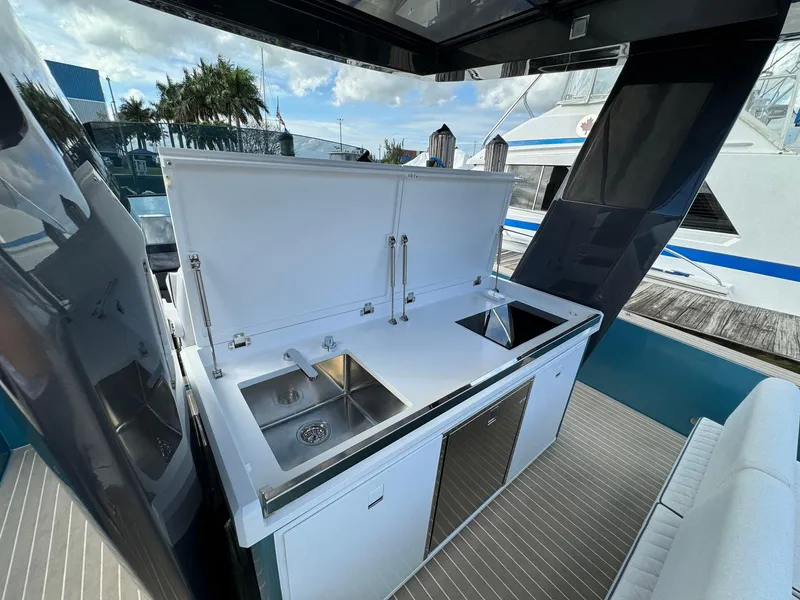 Slide: The Image of Outdoor kitchen on the 2025 Fiart 39 Seawalker yacht with sink and stove. - 12