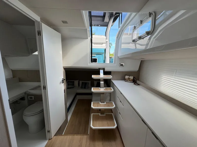 Slide: The Image of Interior of 2025 Fiart 39 Seawalker yacht with modern design and wooden flooring. - 14