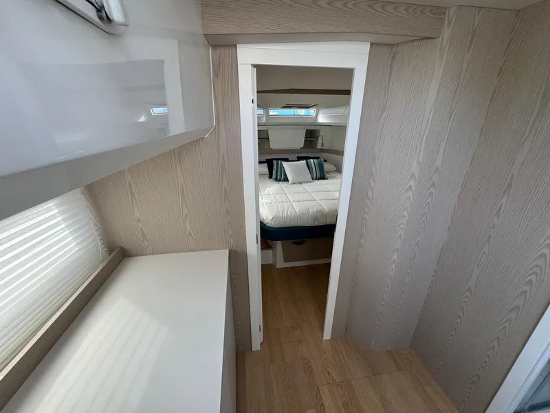 Slide: The Image of Interior cabin of 2025 Fiart 39 Seawalker yacht with modern wood finish. - 19