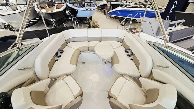 Slide: The Image of Interior view of a 2014 Crownline 255 SS boat with seating area. - 19