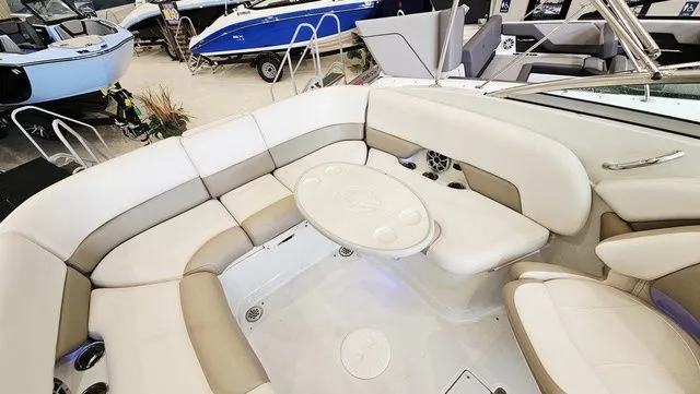 Slide: The Image of Interior of a 2014 Crownline 255 SS boat with seating area. - 20