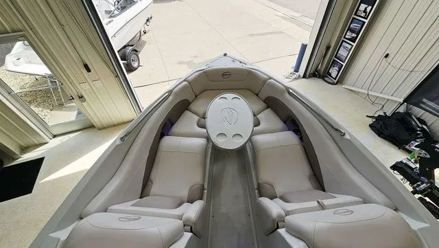 Slide: The Image of Interior view of a 2014 Crownline 255 SS boat with seating area. - 21