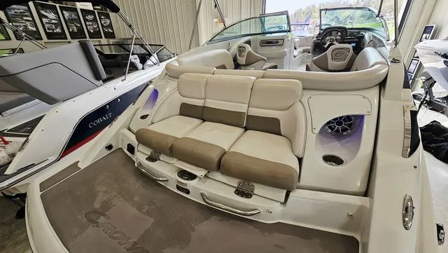 Slide: The Image of Interior of a 2014 Crownline 255 SS boat with beige seating. - 9