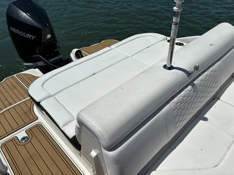 Slide: The Image of 2023 Sea Ray SDX 270 Outboard boat with Mercury engine, white seating, and teak flooring. - 22