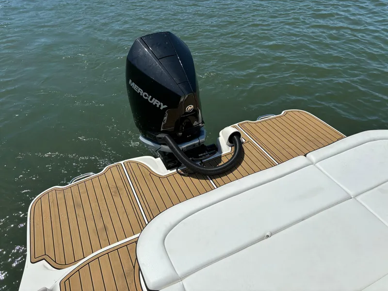Slide: The Image of 2023 Sea Ray SDX 270 Outboard with Mercury engine on water. - 23