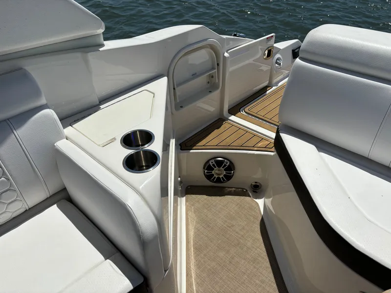 Slide: The Image of Interior of 2023 Sea Ray SDX 270 Outboard boat with cup holders and seating. - 33