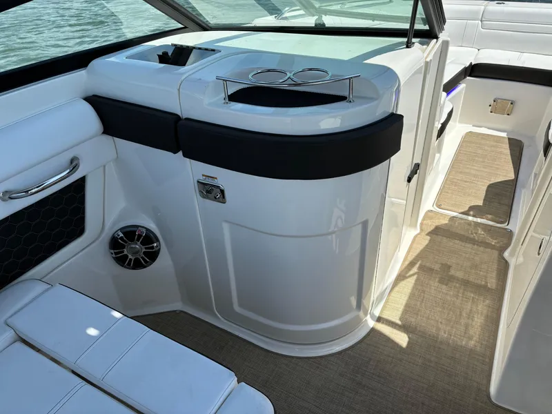 Slide: The Image of Interior of 2023 Sea Ray SDX 270 Outboard boat with seating and speaker. - 40