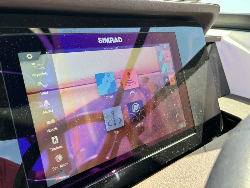 Slide: The Image of Simrad navigation display on 2023 Sea Ray SDX 270 Outboard boat. - 44