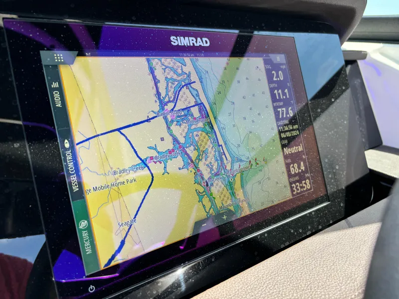 Slide: The Image of Simrad navigation display on 2023 Sea Ray SDX 270 Outboard boat. - 45