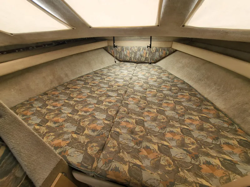 Slide: The Image of Interior cabin of 2000 Bayliner 2859 Ciera Express with patterned upholstery. - 9