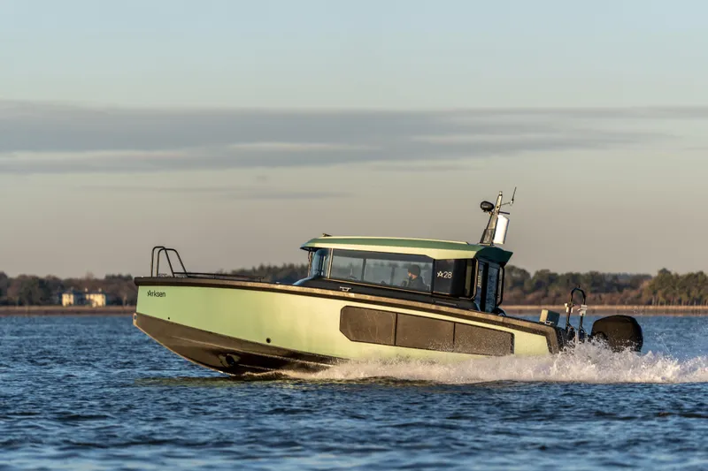 The Image of 2025 Arksen 28 boat cruising on open water. - 0