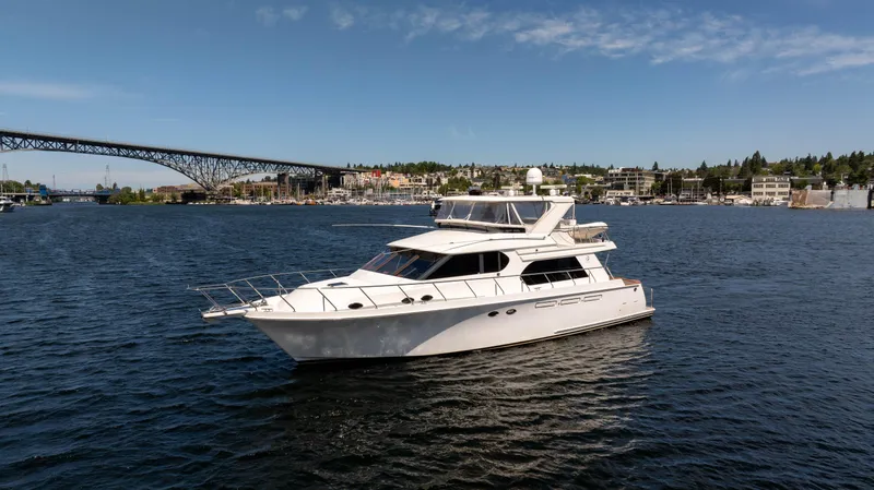 The Image of 2006 Ocean Alexander 58 Pilothouse yacht cruising on a sunny day. - 0