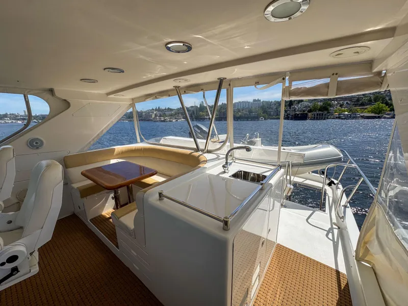 Slide: The Image of Luxurious 2006 Ocean Alexander 58 Pilothouse yacht interior with scenic water view. - 15