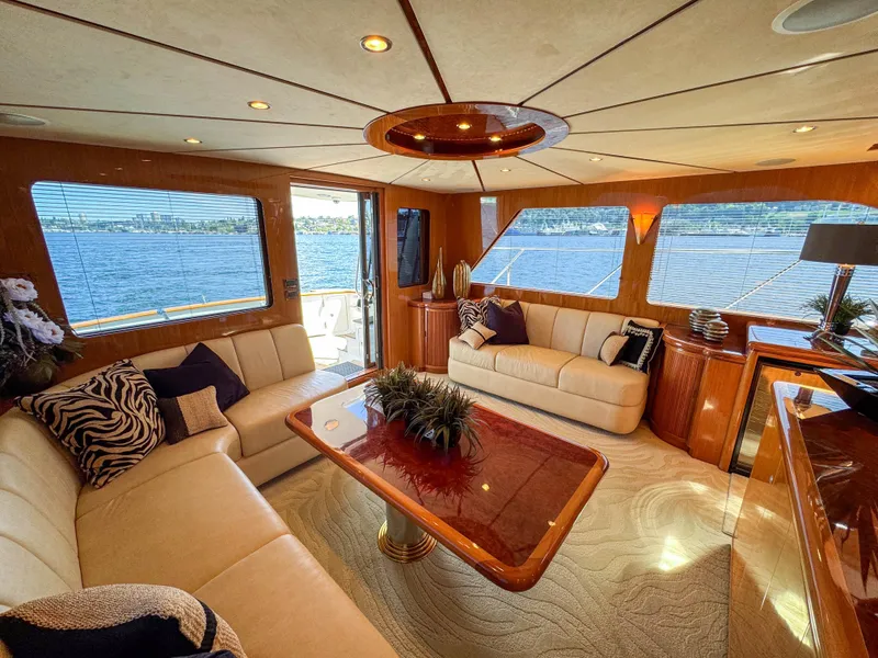 Slide: The Image of Luxurious interior of 2006 Ocean Alexander 58 Pilothouse yacht with elegant seating and panoramic windows. - 20