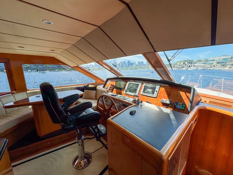 Slide: The Image of Pilothouse interior of 2006 Ocean Alexander 58 yacht with panoramic water views. - 25