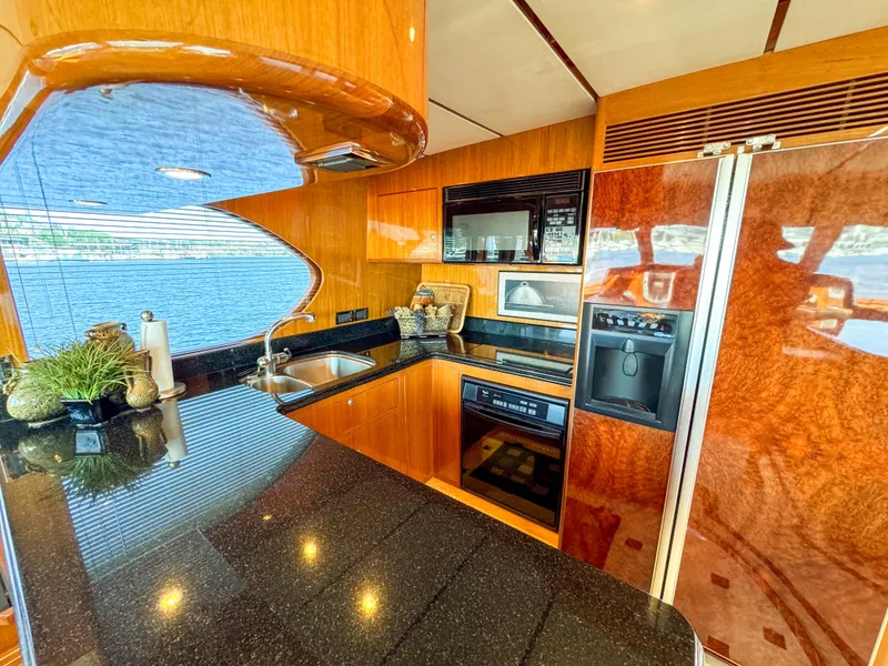 Slide: The Image of Luxurious kitchen in 2006 Ocean Alexander 58 Pilothouse yacht with modern appliances. - 26