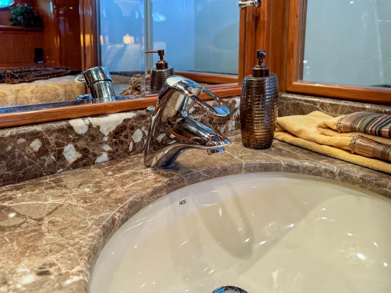 Slide: The Image of Luxurious bathroom sink in a 2006 Ocean Alexander 58 Pilothouse yacht. - 35