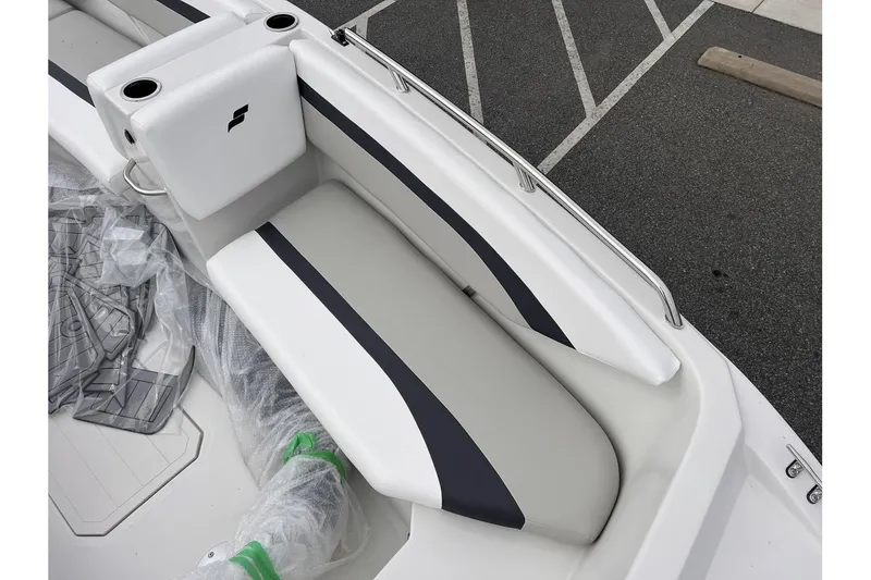 Slide: The Image of 2024 Starcraft SVX 171 OB boat interior seating with cup holders. - 8