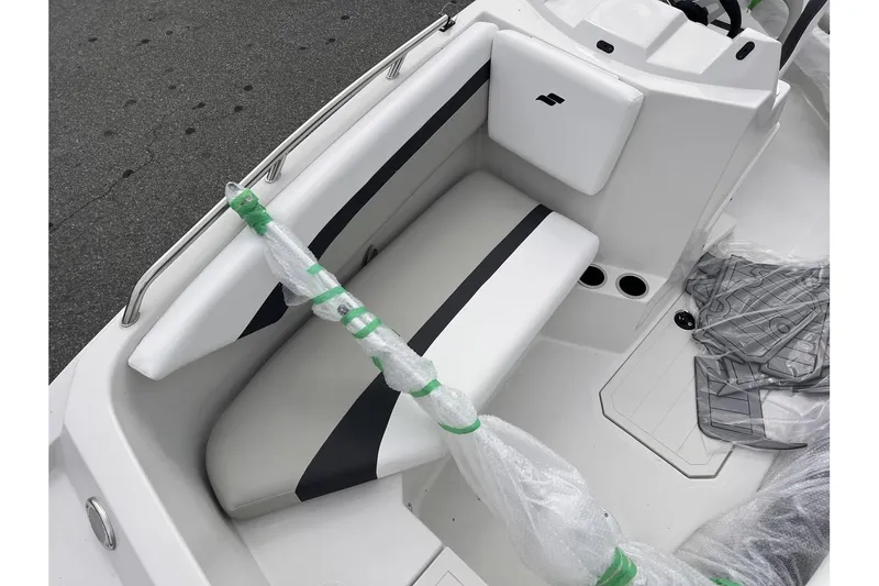 Slide: The Image of 2024 Starcraft SVX 171 OB boat interior seating area. - 9