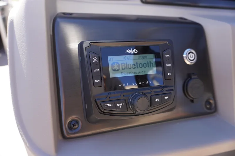 Slide: The Image of 2024 Sun Tracker Party Barge 20 DLX audio system with Bluetooth connectivity. - 12