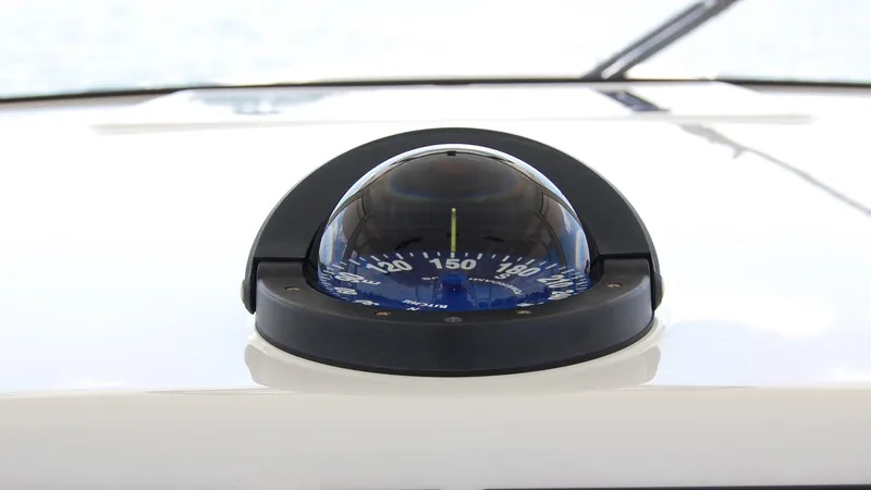 Slide: The Image of Compass on the 2019 Regulator 41 boat dashboard. - 15