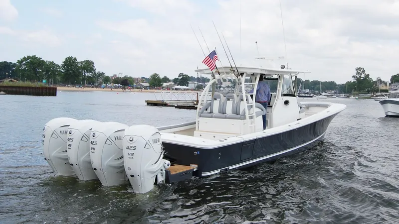 Slide: The Image of 2019 Regulator 41 boat with quad Yamaha 425 engines on the water. - 23
