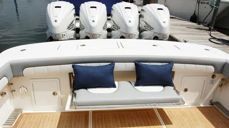 Slide: The Image of 2019 Regulator 41 boat with quad engines and cushioned seating. - 27