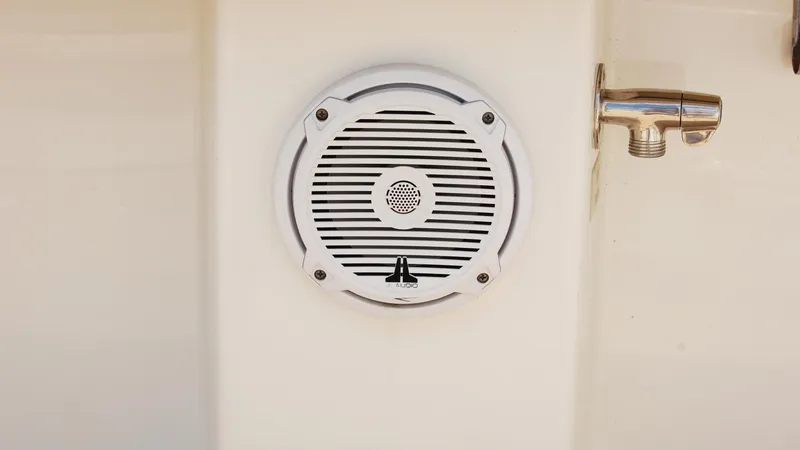 Slide: The Image of White speaker on a 2019 Regulator 41 boat. - 28