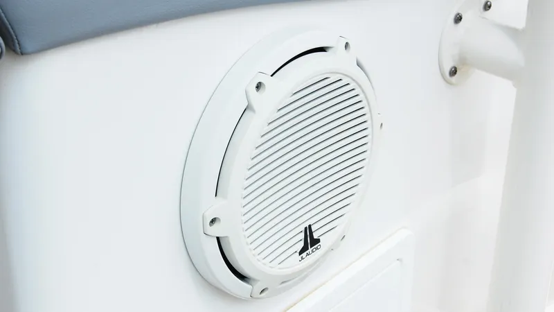 Slide: The Image of White JL Audio speaker on a 2019 Regulator 41 boat. - 30