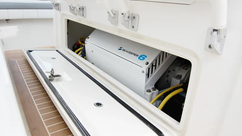 Slide: The Image of 2019 Regulator 41 boat with Seakeeper 6 stabilizer system in storage compartment. - 36