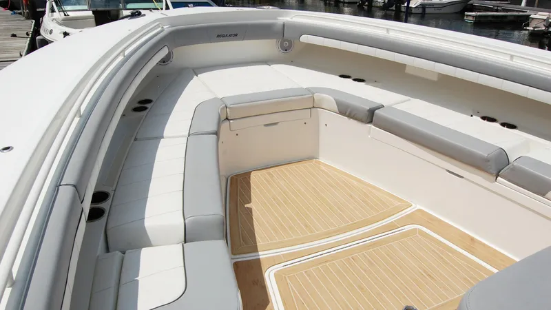 Slide: The Image of 2019 Regulator 41 boat with spacious seating and teak flooring. - 38