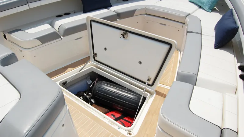 Slide: The Image of Storage compartment on a 2019 Regulator 41 boat with seating area. - 44