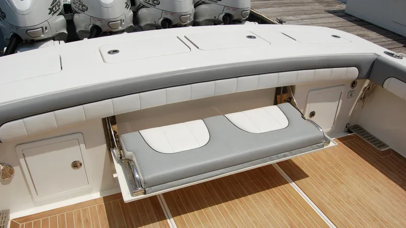 Slide: The Image of 2019 Regulator 41 boat with fold-down seating and teak deck. - 49