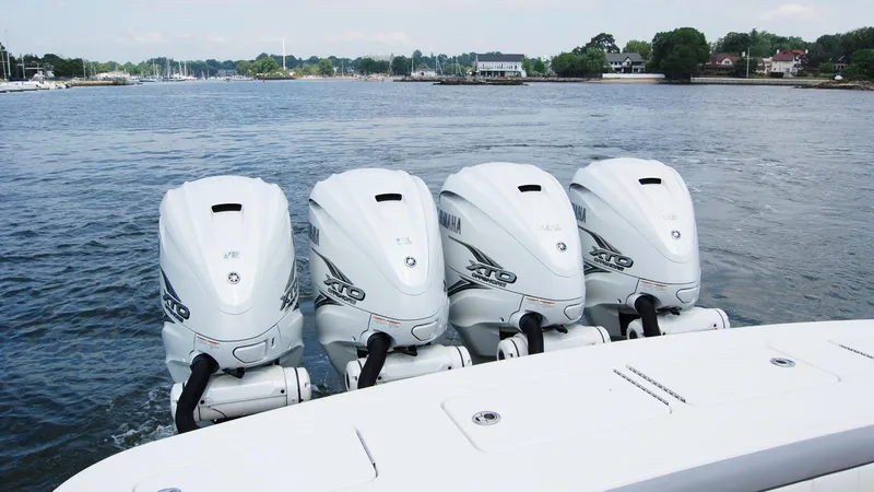 Slide: The Image of 2019 Regulator 41 boat with four Yamaha outboard engines on the water. - 5