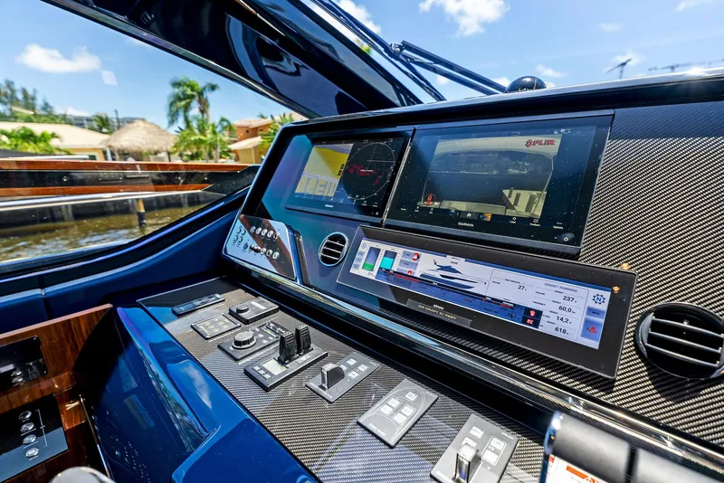 Slide: The Image of Control panel of a 2020 Riva 66' Ribelle yacht with advanced navigation systems. - 27