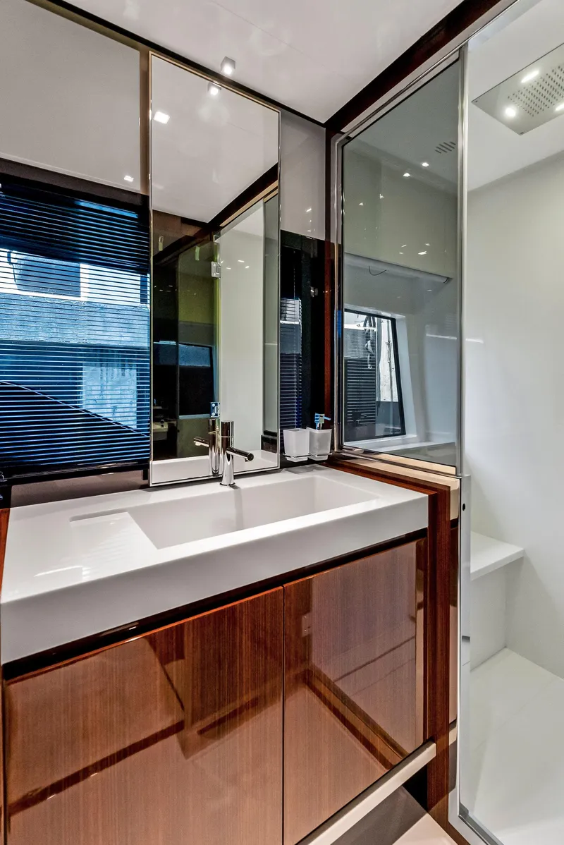 Slide: The Image of Modern bathroom on 2020 Riva 66' Ribelle yacht with sleek design and glass shower. - 34