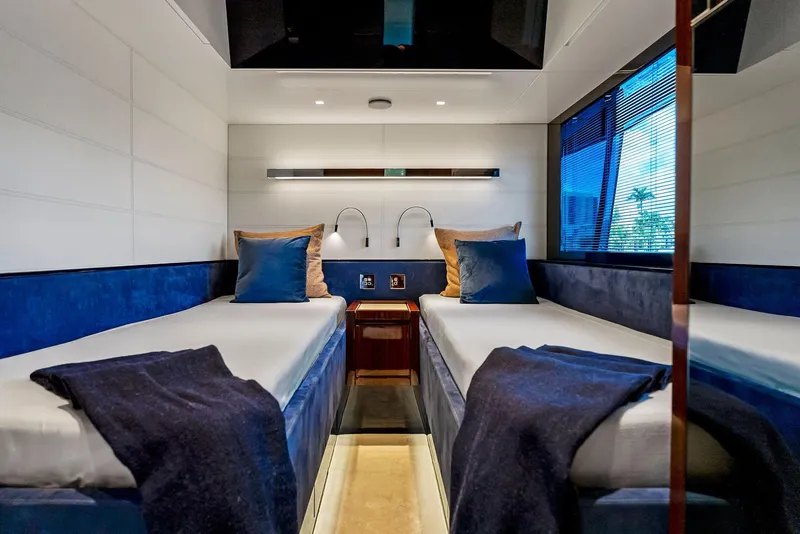 Slide: The Image of Luxurious twin cabin interior of 2020 Riva 66' Ribelle yacht with modern design. - 42