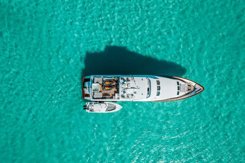 Slide: The Image of Aerial view of 2006 Hargrave Motor Yacht on clear turquoise water. - 17