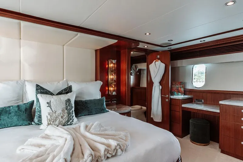 Slide: The Image of Luxurious bedroom in a 2006 Hargrave Motor Yacht with elegant decor and plush bedding. - 20