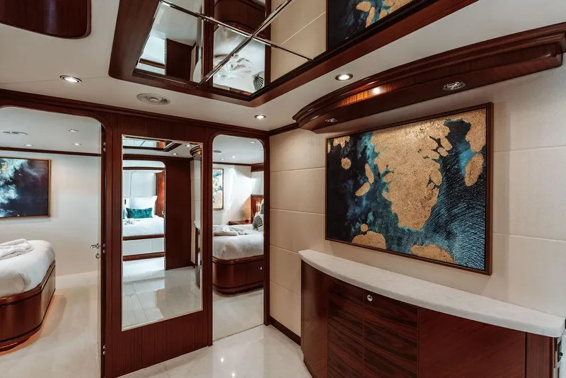 Slide: The Image of Luxurious interior of a 2006 Hargrave Motor Yacht with elegant wood finishes and modern decor. - 22
