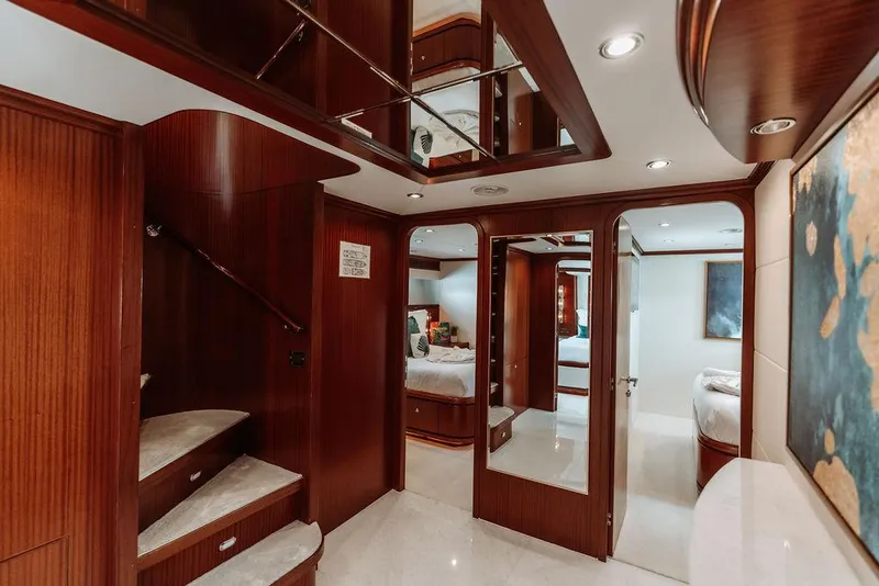 Slide: The Image of Luxurious interior of 2006 Hargrave Motor Yacht with wooden finishes and mirrored walls. - 23