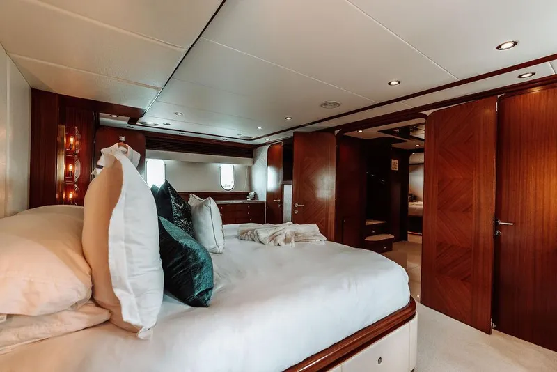 Slide: The Image of Luxurious bedroom interior of 2006 Hargrave Motor Yacht with elegant wood finishes. - 30