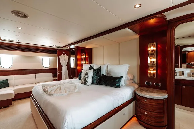 Slide: The Image of Luxurious bedroom in a 2006 Hargrave Motor Yacht with elegant wood finishes. - 33
