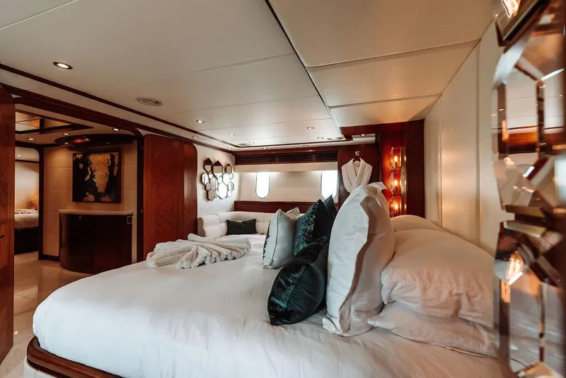 Slide: The Image of Luxurious bedroom interior of a 2006 Hargrave Motor Yacht with elegant decor. - 35