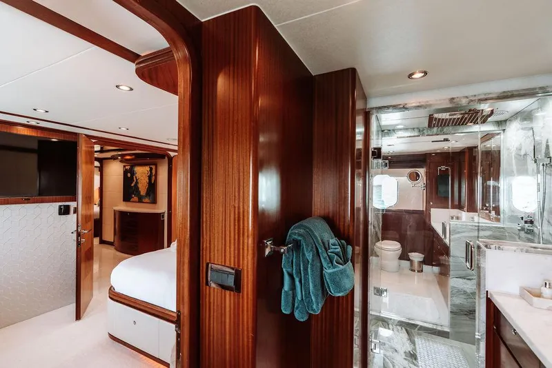 Slide: The Image of Luxurious interior of a 2006 Hargrave Motor Yacht with wooden finishes and modern amenities. - 37