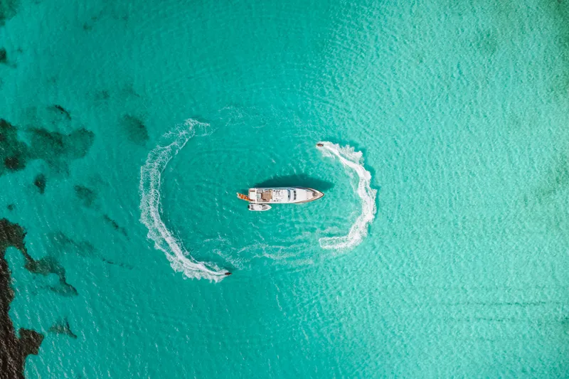 Slide: The Image of Aerial view of 2006 Hargrave Motor Yacht in turquoise waters. - 4