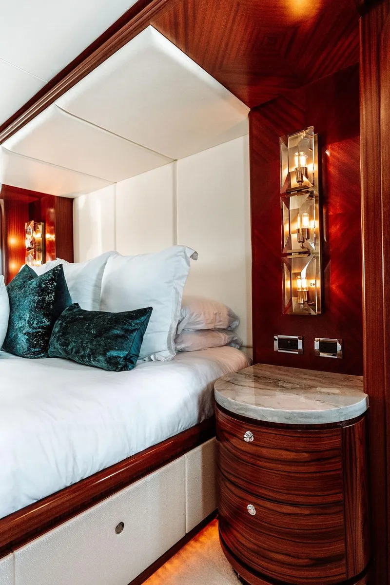 Slide: The Image of Luxurious bedroom interior of 2006 Hargrave Motor Yacht with elegant wood finishes. - 47