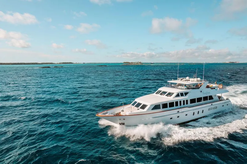 Slide: The Image of 2006 Hargrave Motor Yacht cruising on open blue waters. - 7