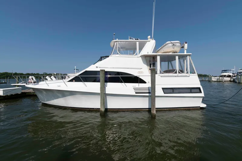 The Image of 1994 Ocean Yachts 44 Aft Cabin Motor Yacht docked on a sunny day. - 0