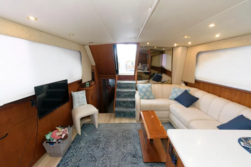Slide: The Image of Spacious interior of 1994 Ocean Yachts 44 Aft Cabin Motor Yacht with cozy seating area. - 17